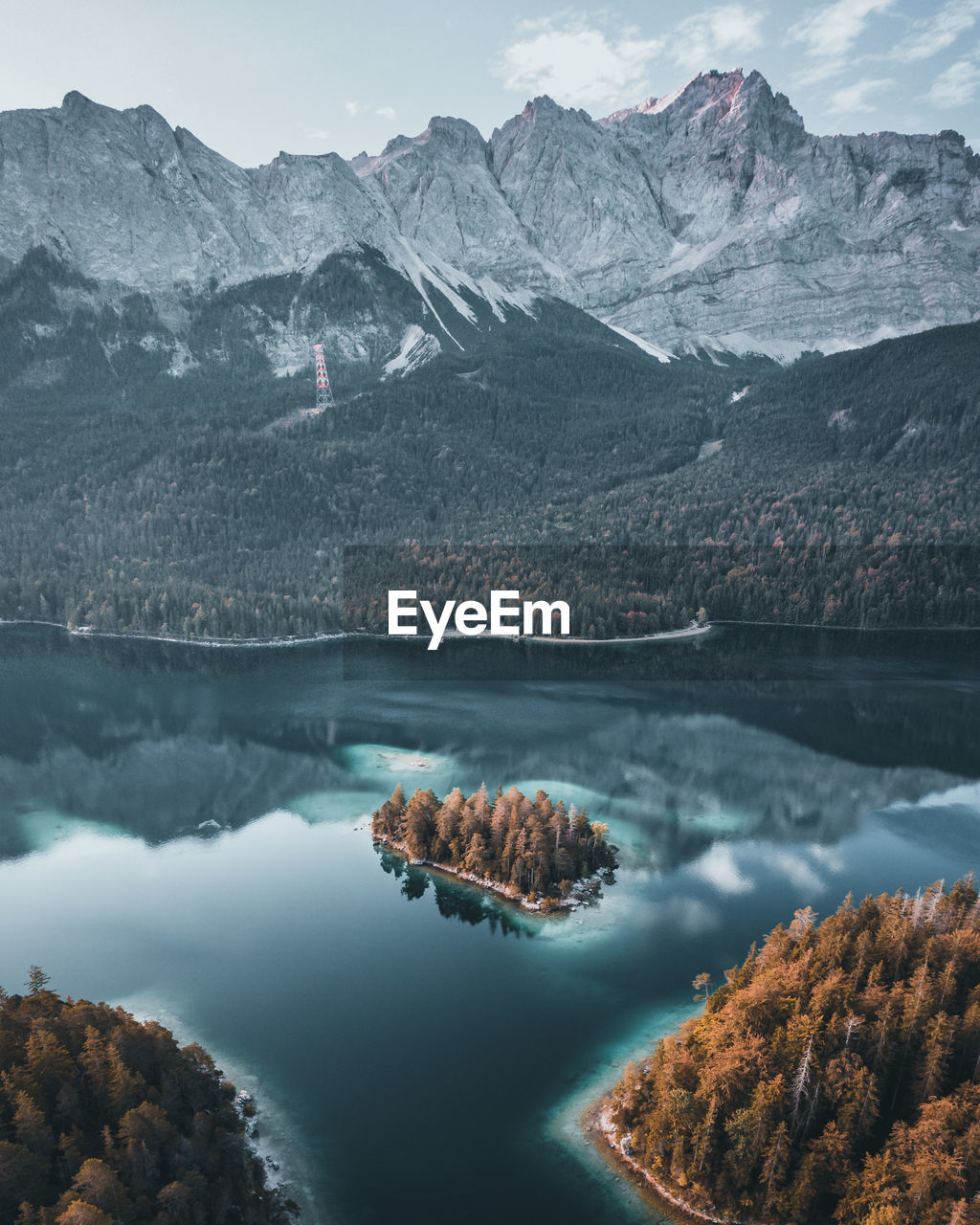 Scenic view of lake and snowcapped mountains