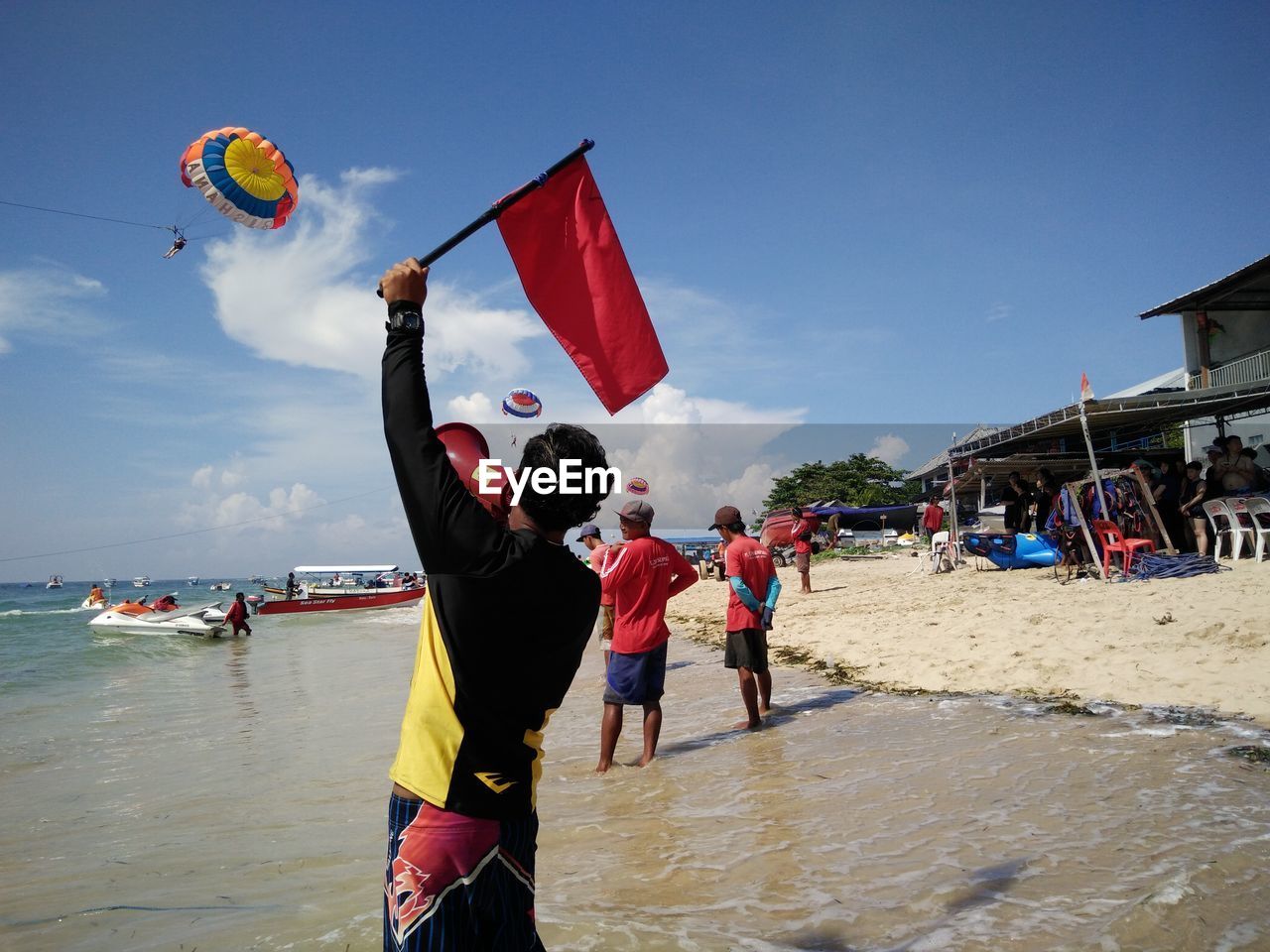 TOURISTS ENJOYING AT BEACH