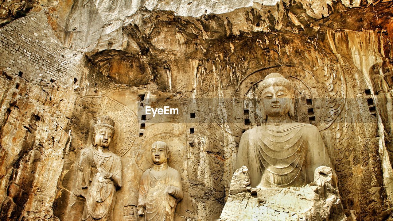 Low angle view of buddha statue