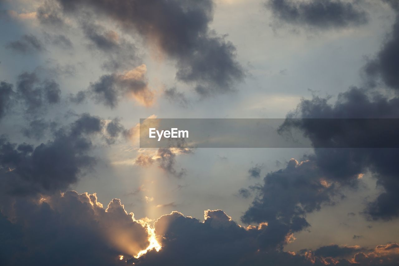 Low angle view of clouds in sky during sunset