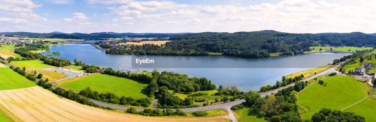 PANORAMIC VIEW OF LAKE AGAINST SKY