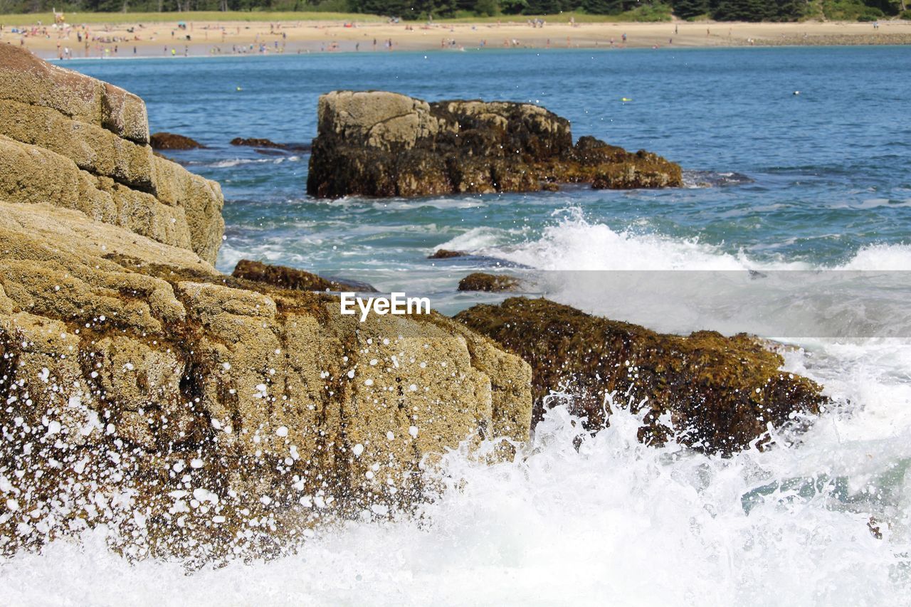 SCENIC VIEW OF SEA AND ROCKS