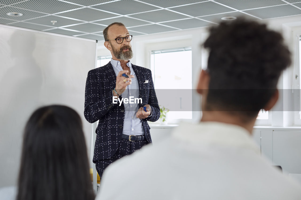 Man talking during business meeting