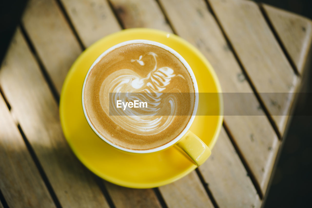 High angle view of cappuccino on table