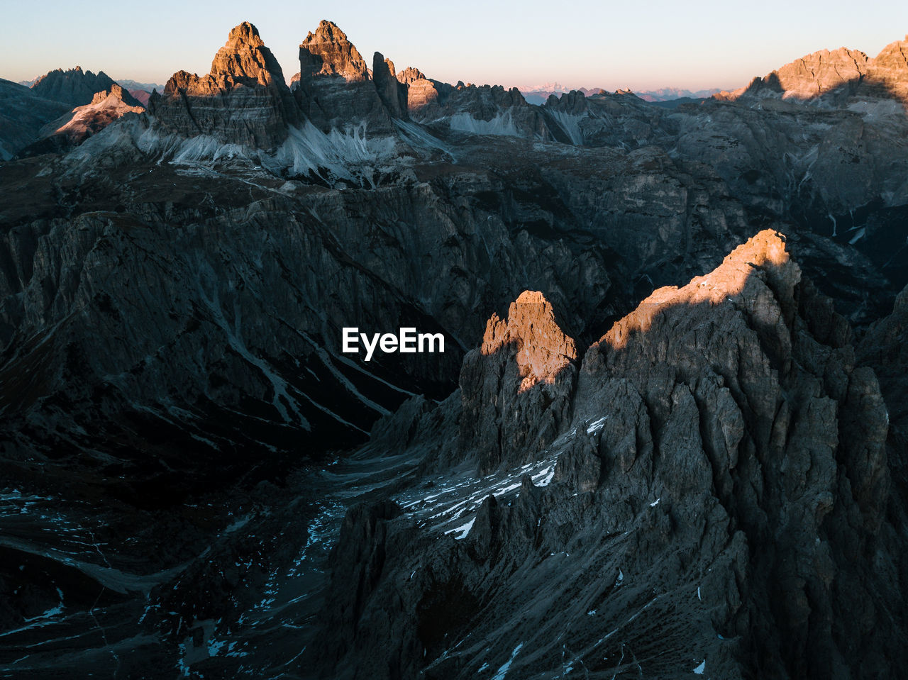 Scenic view of rock mountains against clear sky