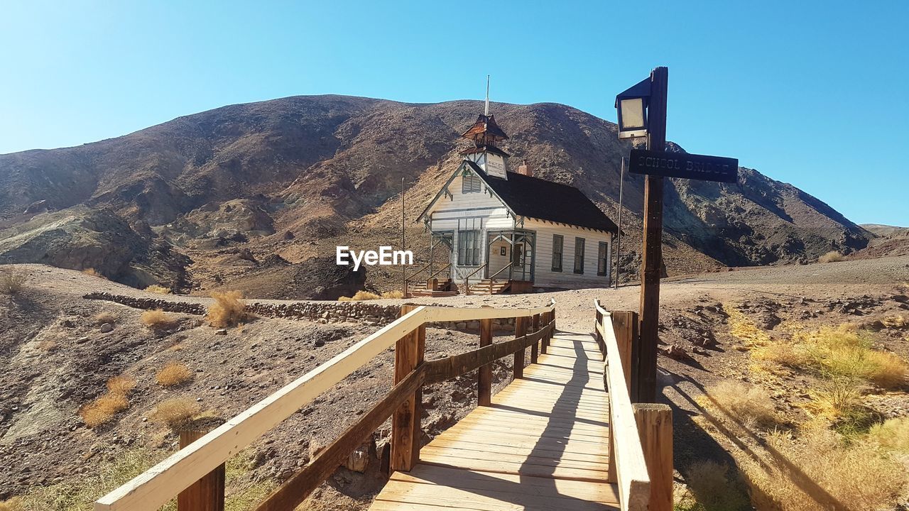 BUILT STRUCTURE ON LAND AGAINST CLEAR SKY