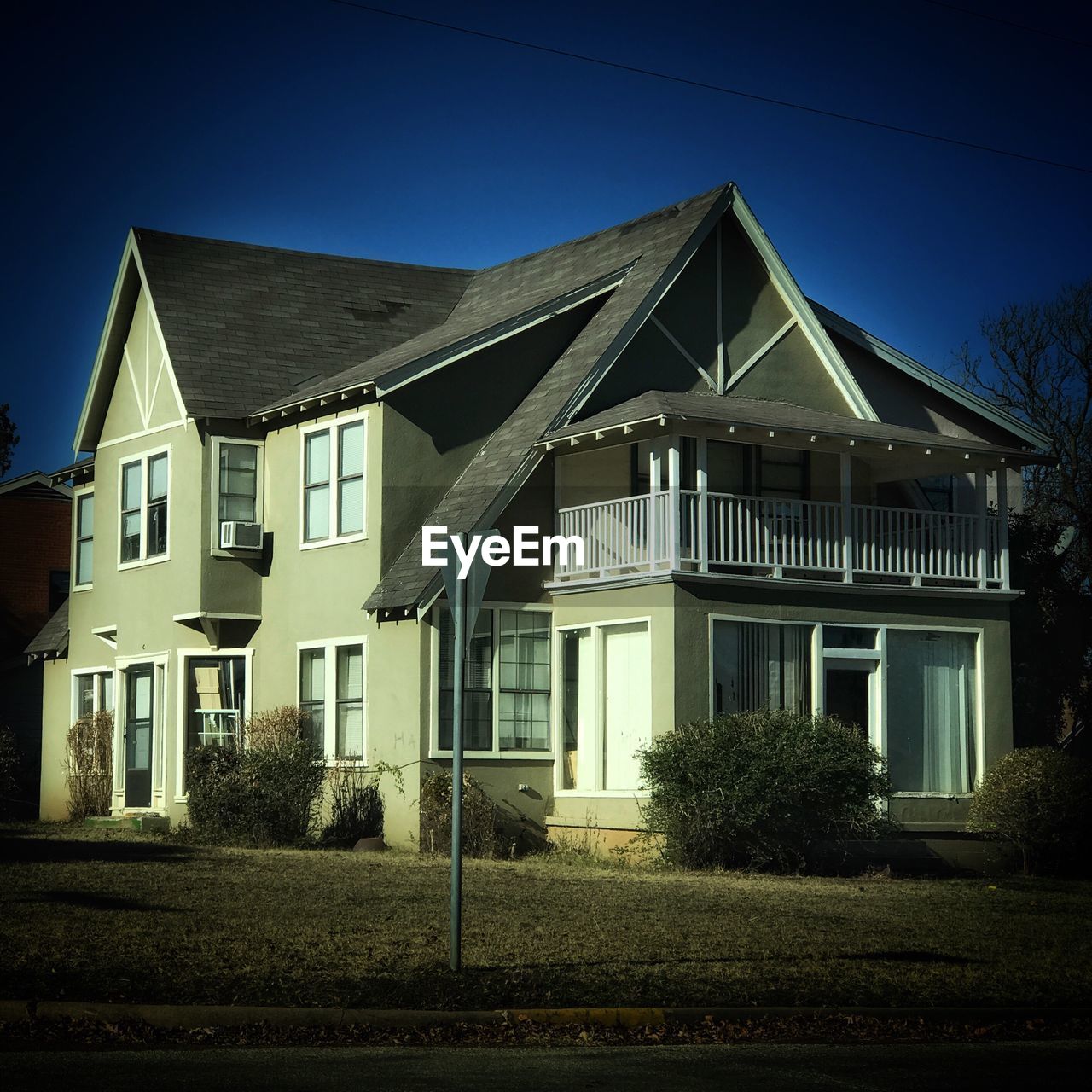 HOUSES AGAINST SKY