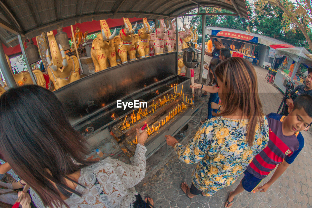 HIGH ANGLE VIEW OF WOMAN AT MARKET