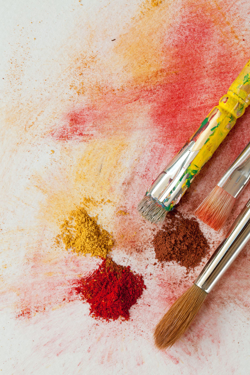 High angle view of paintbrushes on table