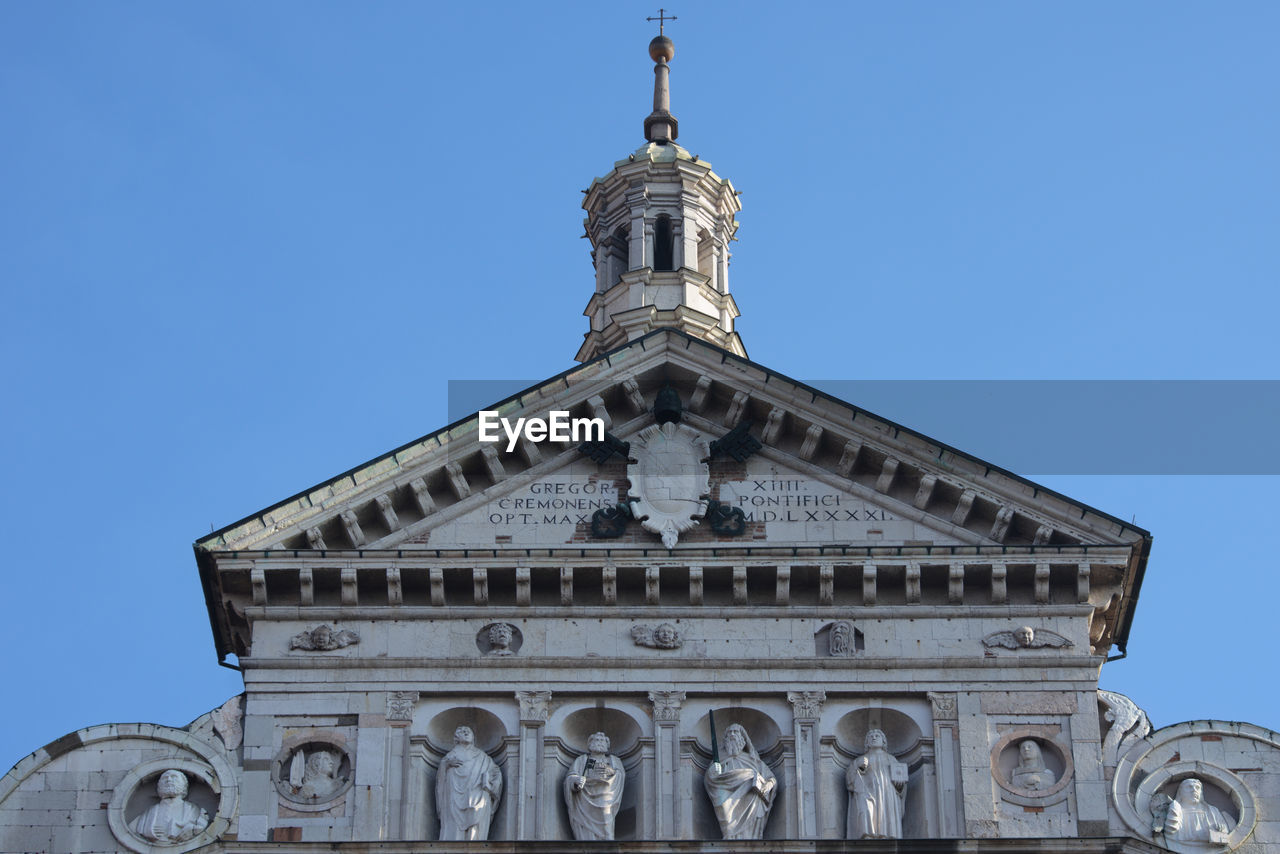 architecture, built structure, building exterior, landmark, sky, travel destinations, clear sky, blue, building, no people, history, place of worship, the past, nature, low angle view, day, religion, travel, city, belief, sunny, tower, tourism, outdoors, facade, worship, monument, spirituality, spire