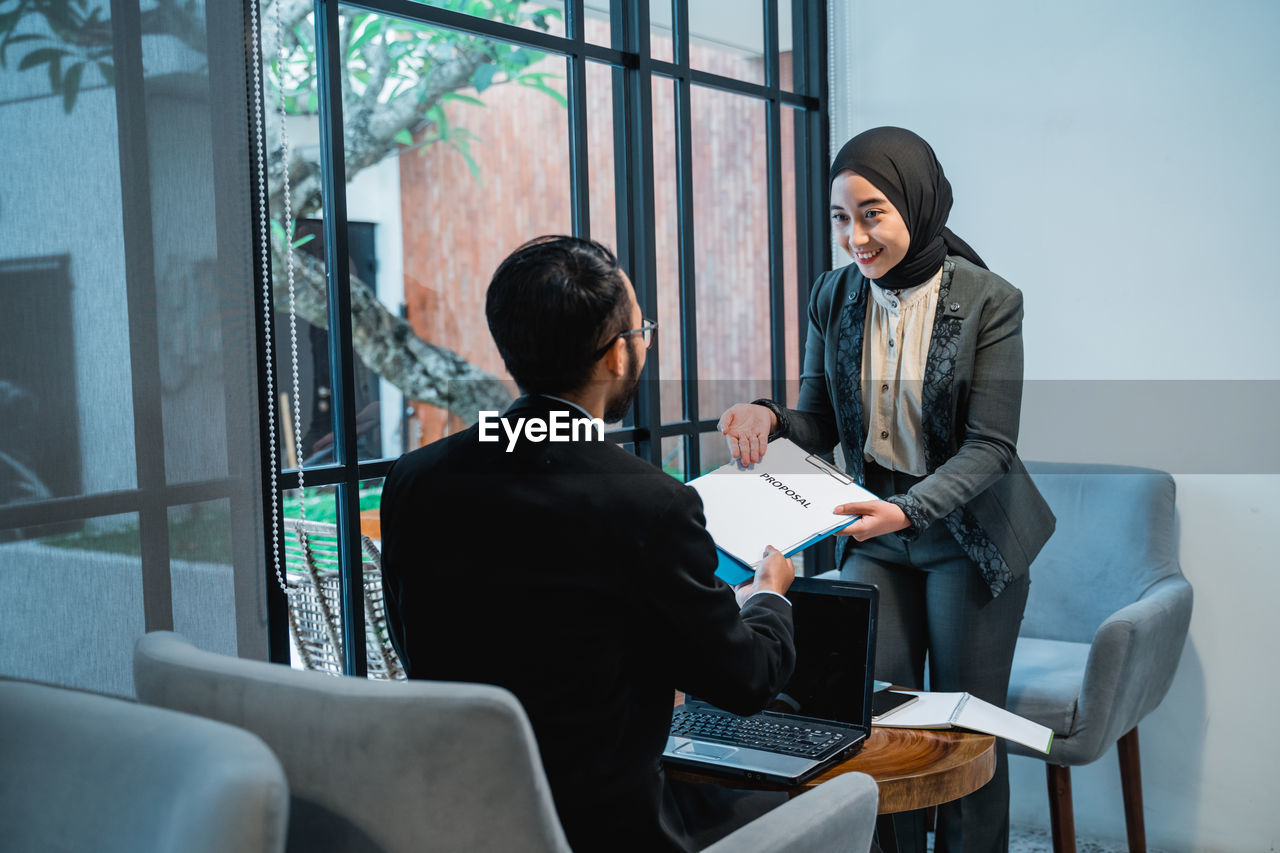 portrait of business colleagues working in meeting