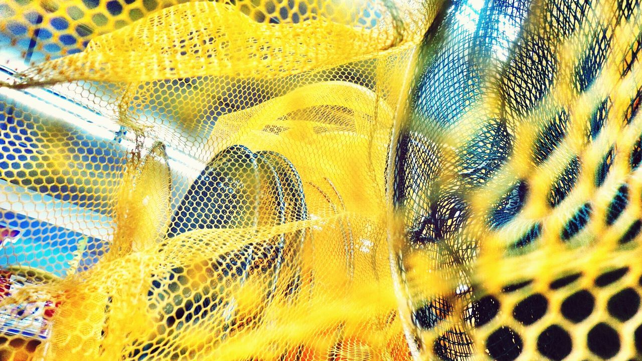 Full frame shot of yellow net