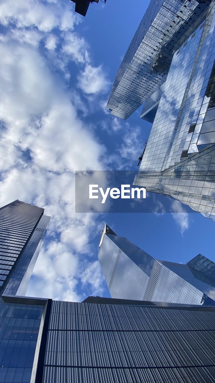 Low angle view of modern building against sky