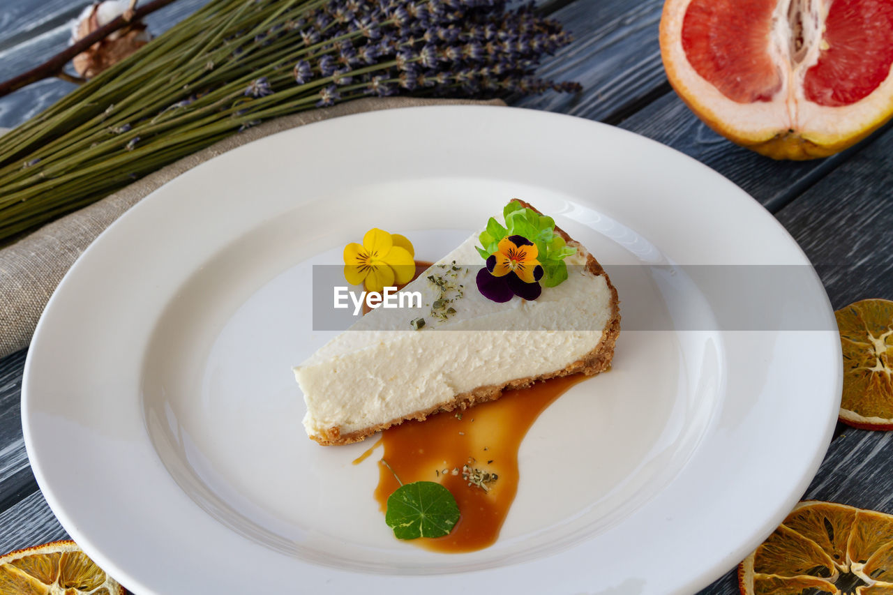 HIGH ANGLE VIEW OF DESSERT SERVED IN PLATE