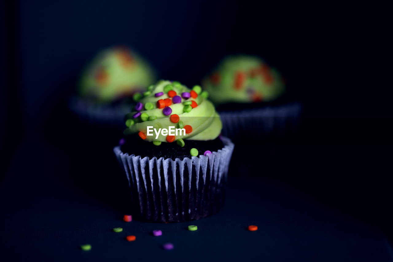 Close-up of cupcakes on table