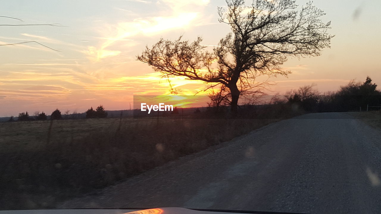 SCENIC VIEW OF LANDSCAPE AGAINST SKY DURING SUNSET