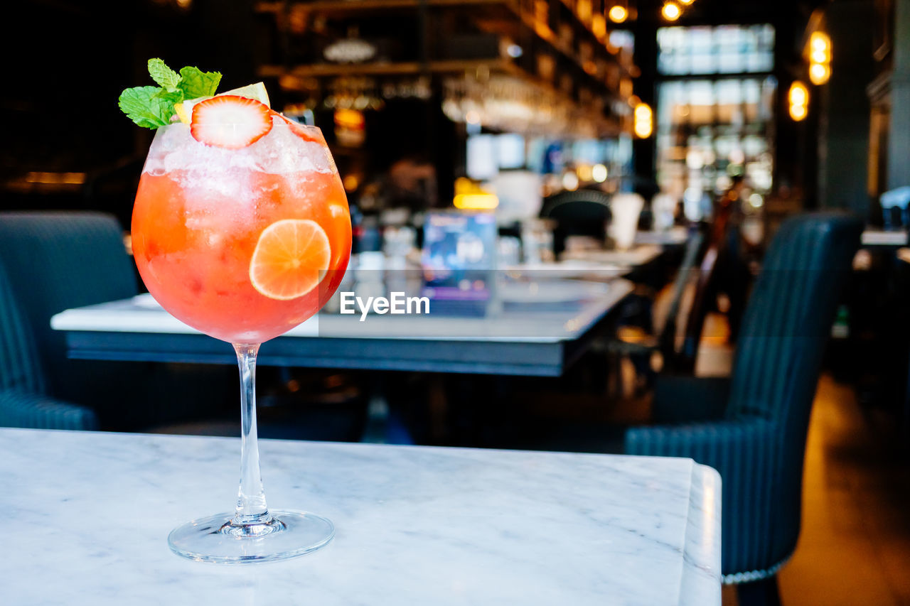 Close-up drink served on table