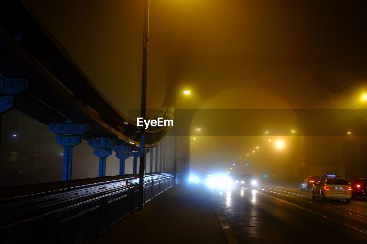 Illuminated street lights at night