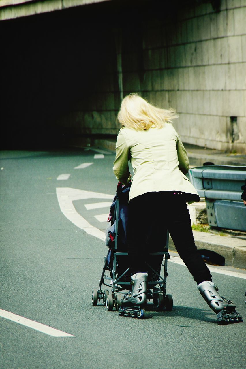 MAN CYCLING ON ROAD