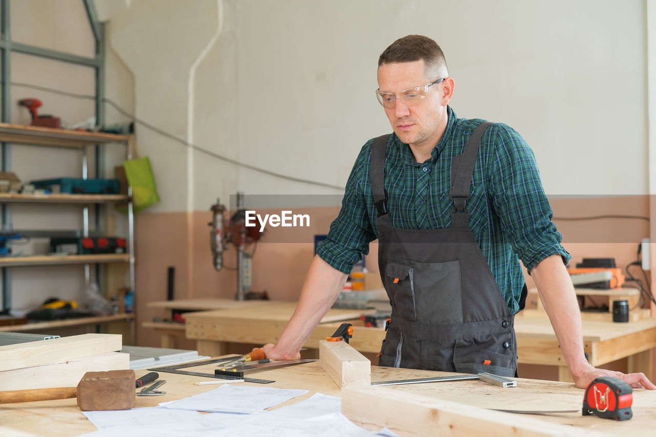 man working at desk in office