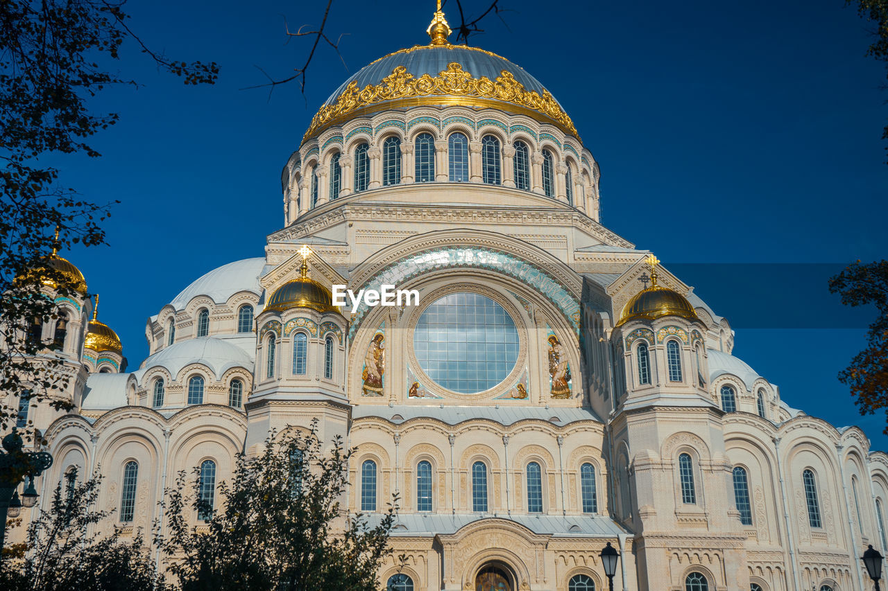 Low angle view of naval cathedral against blue sky