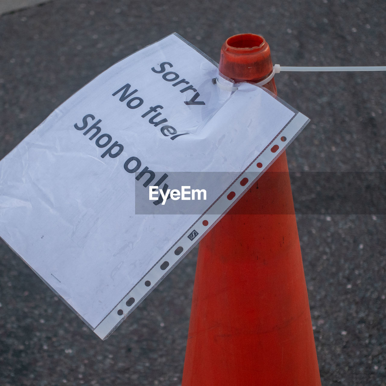 HIGH ANGLE VIEW OF TEXT WRITTEN ON STREET