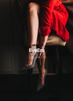 Putting on store high heels