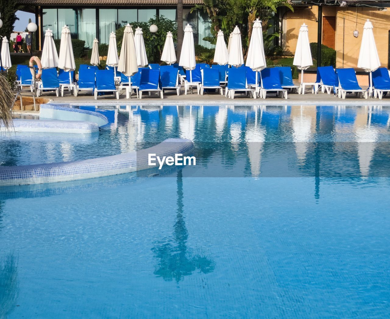 Reflection of closed canopies in swimming pool