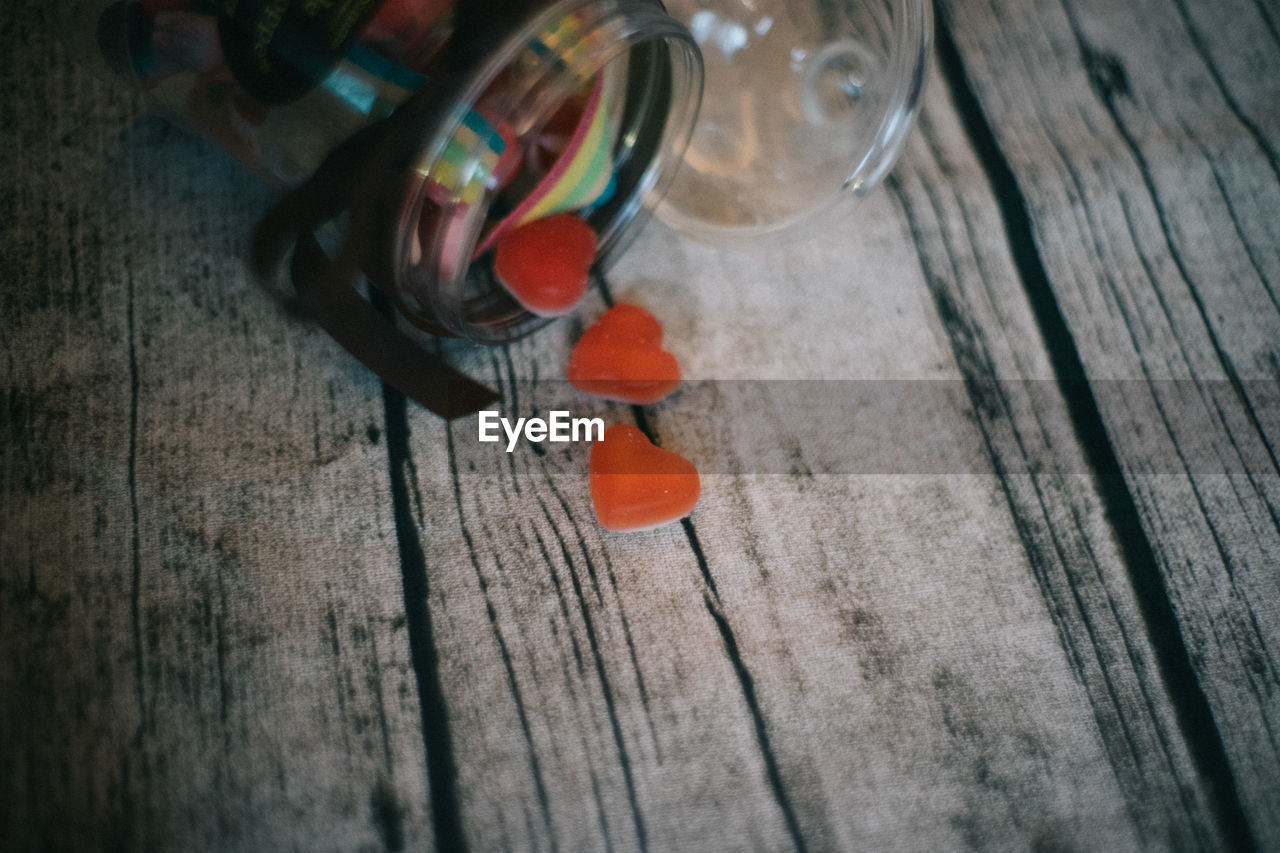 CLOSE-UP OF MULTI COLORED HEART SHAPE TABLE