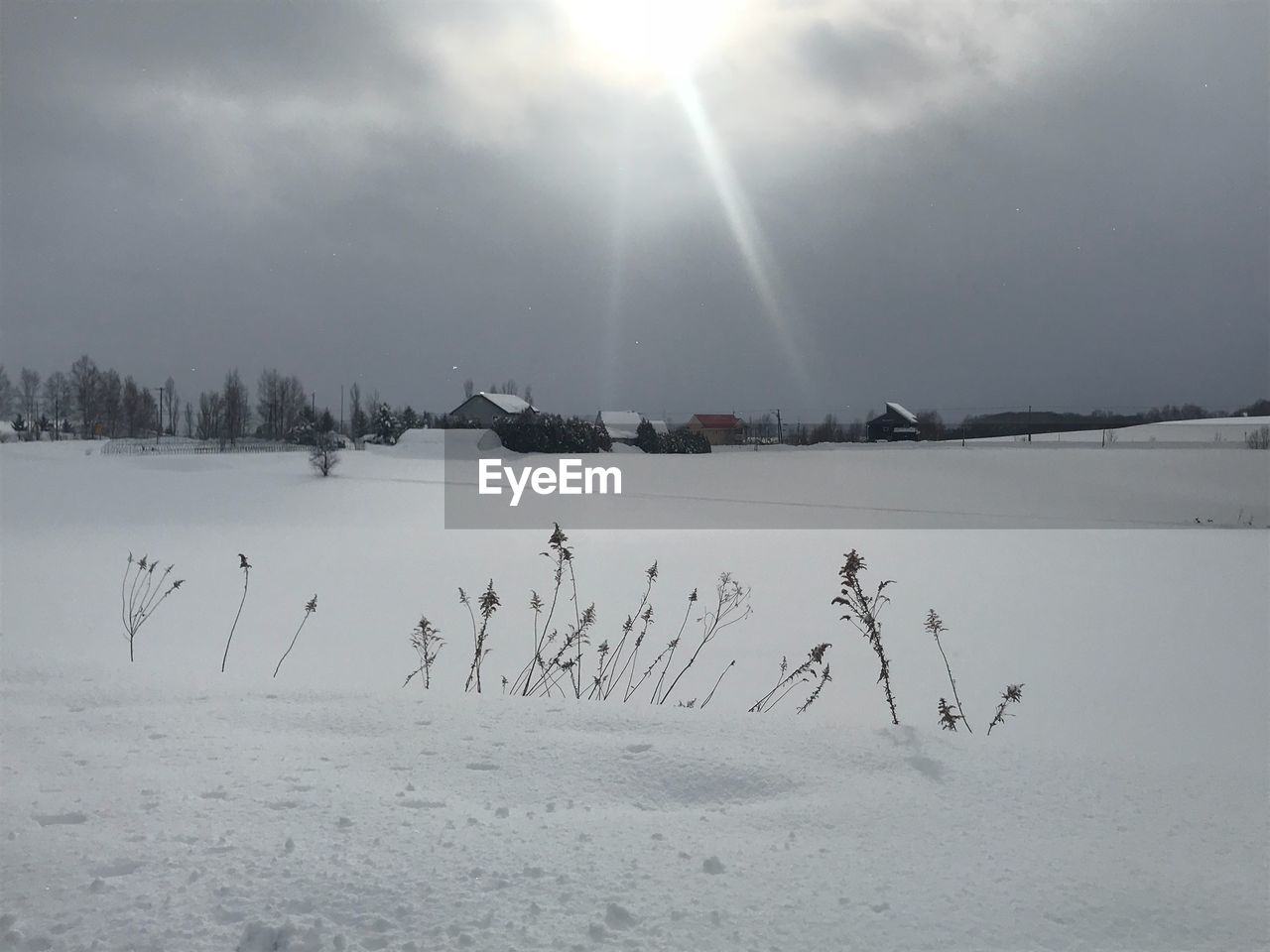 SCENIC VIEW OF FROZEN LAKE DURING WINTER