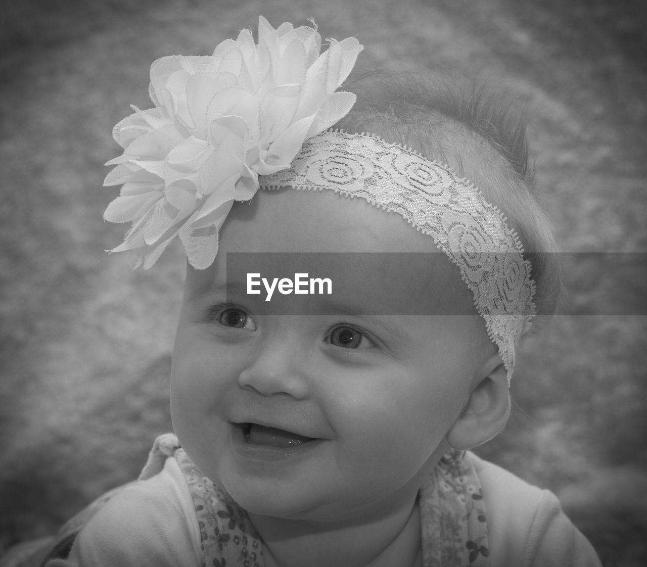 Close-up of cute baby girl wearing headband