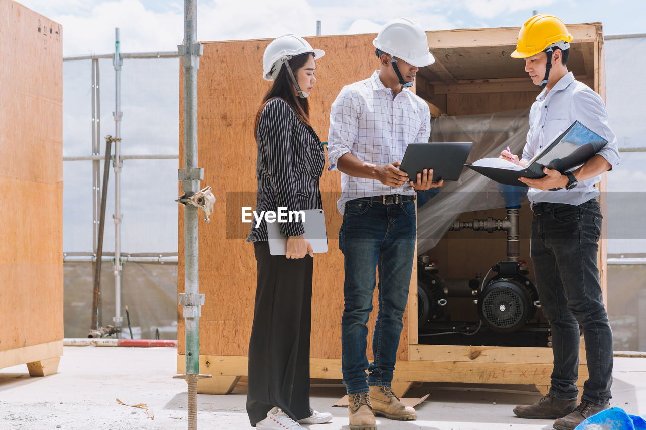 Project engineer, engineer and technician working on construction site