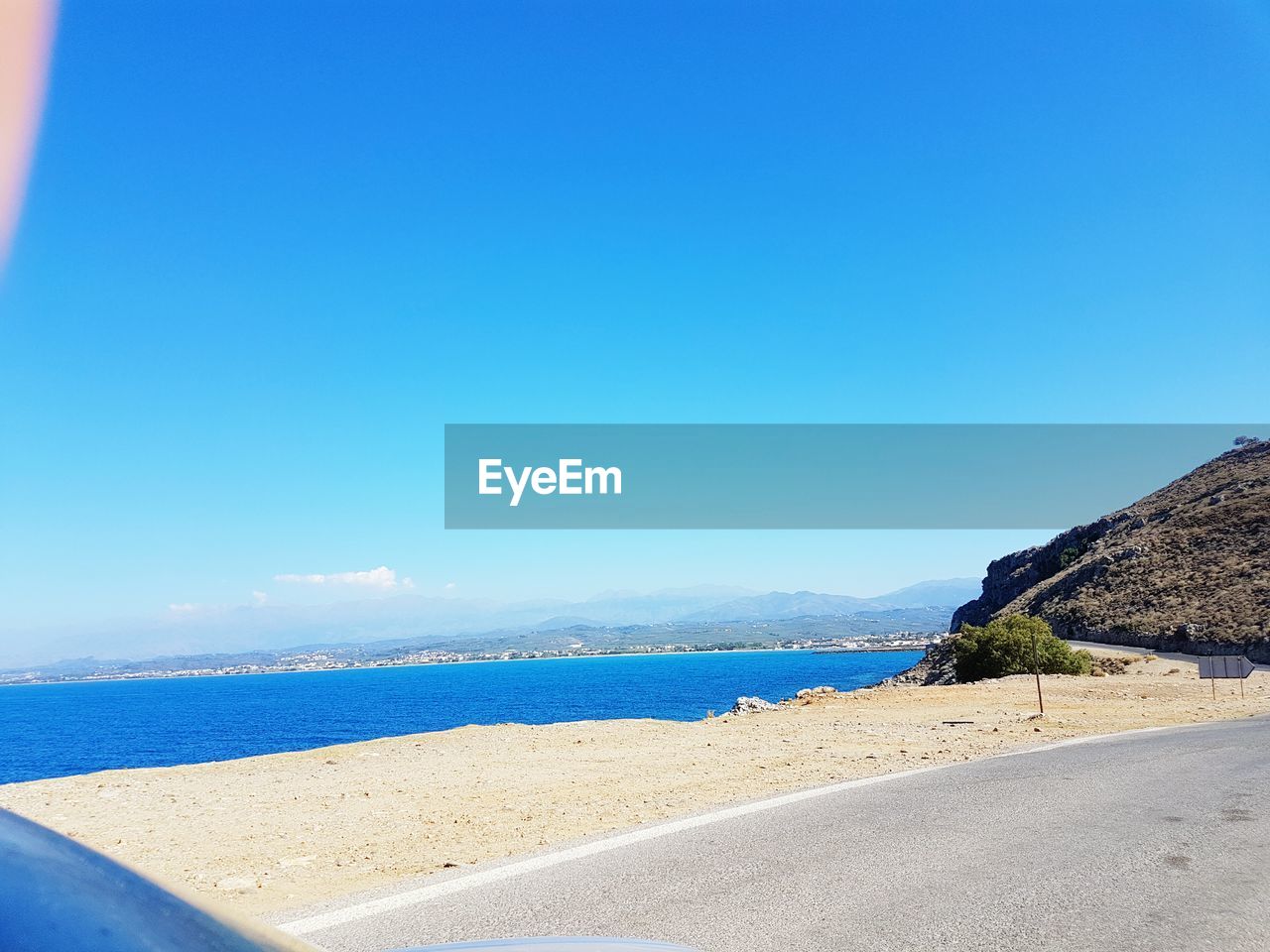 VIEW OF CALM BLUE SEA AGAINST CLEAR SKY