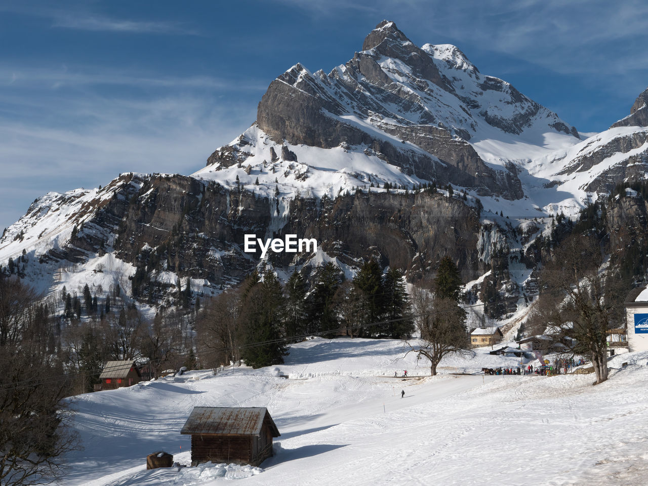 SCENIC VIEW OF SNOWCAPPED MOUNTAINS AGAINST SKY DURING WINTER