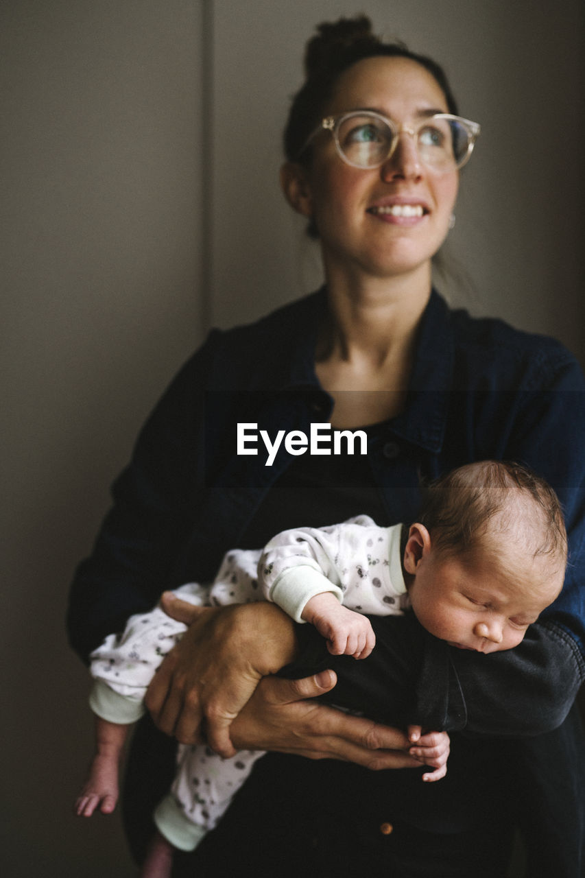 Mother holding newborn baby