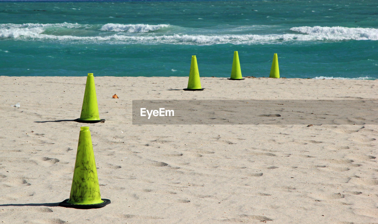 Green cones on beach