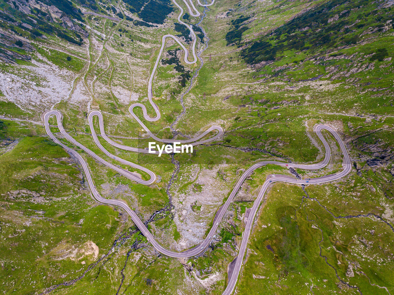 High angle view of winding road on landscape