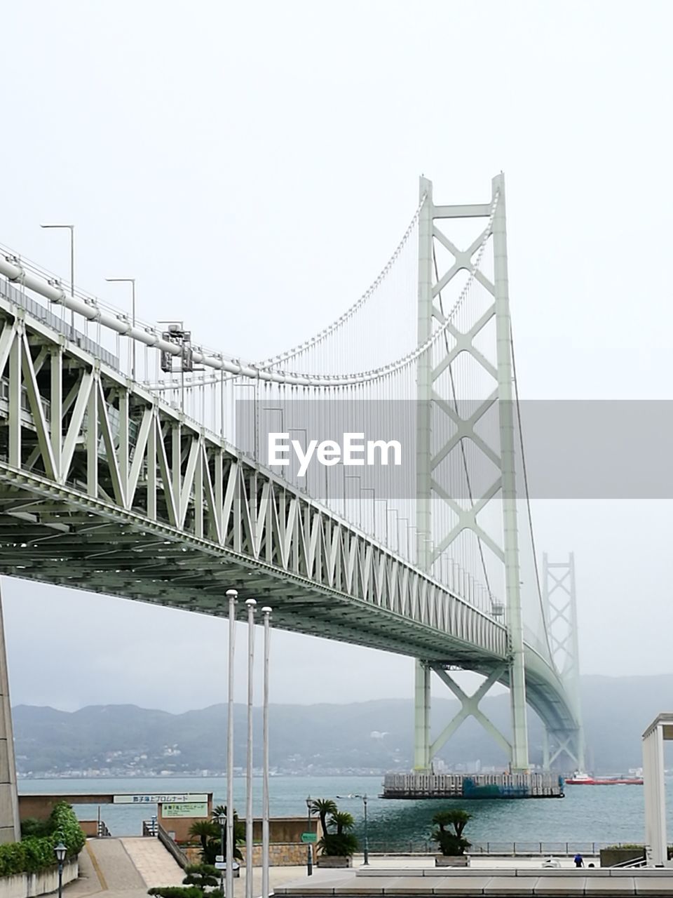 SUSPENSION BRIDGE AGAINST SKY