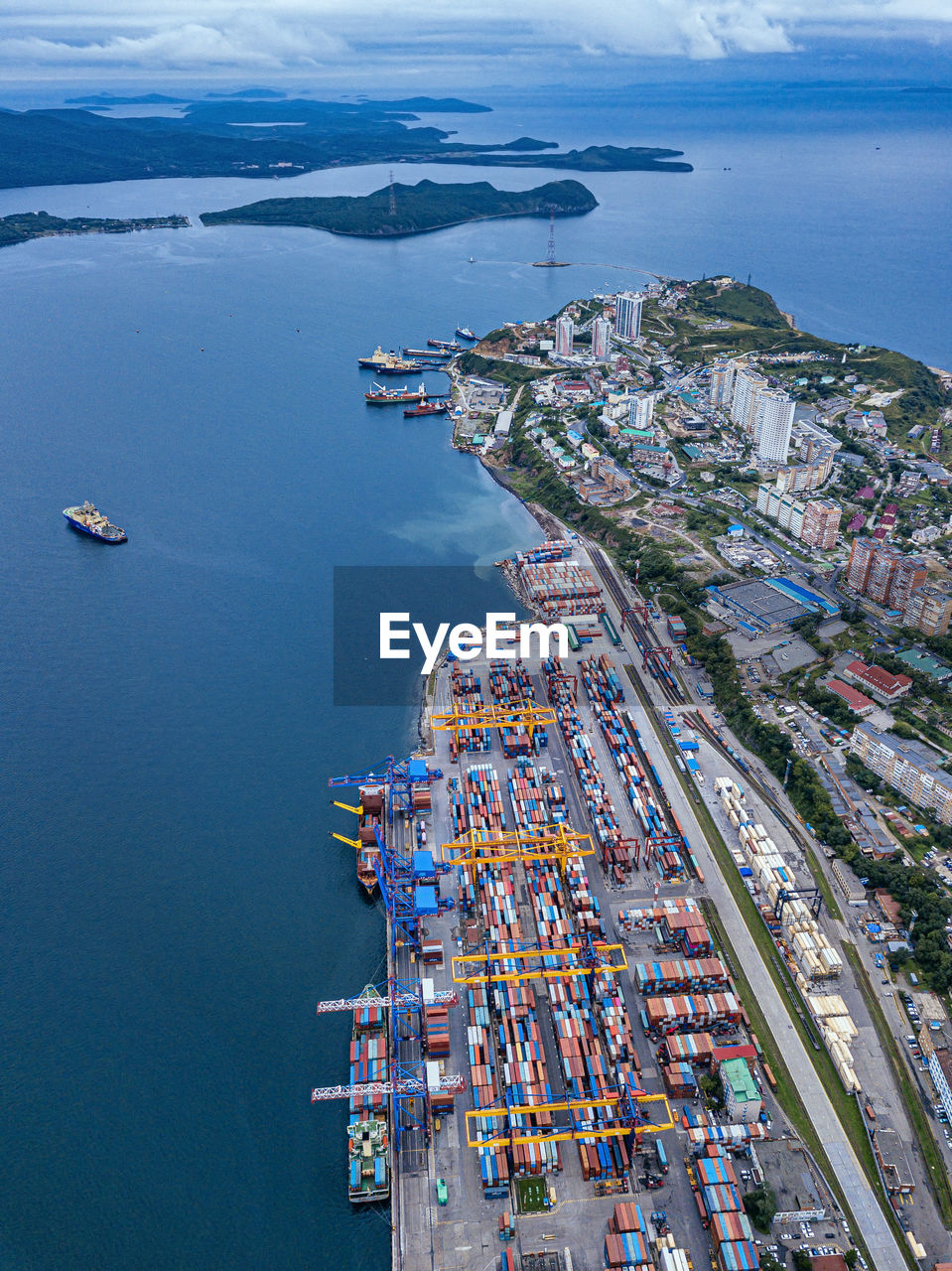 Russia, primorsky krai, vladivostok, aerial view of commercial dock on shore of sea of japan