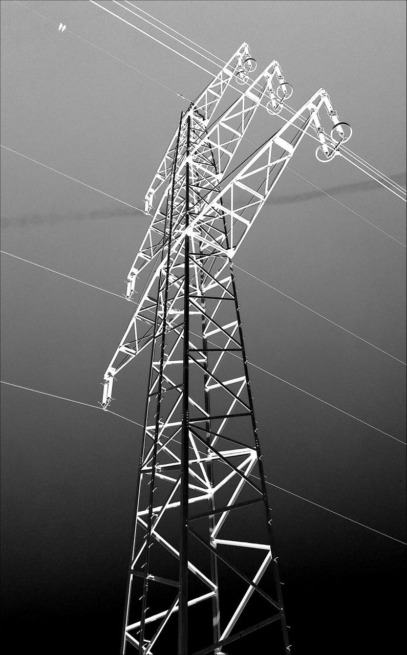 Low angle view of electricity pylon