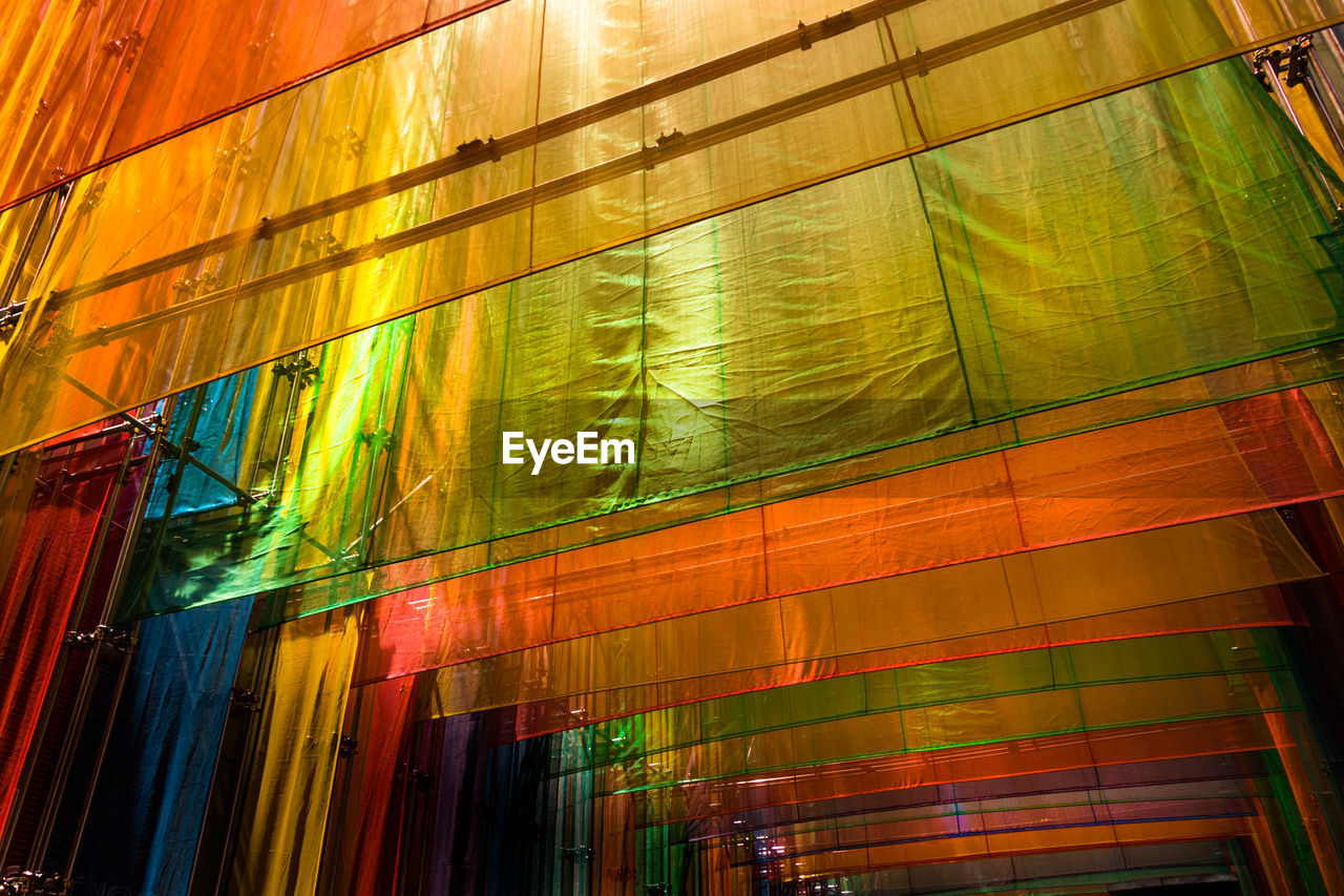 LOW ANGLE VIEW OF ILLUMINATED LIGHTS