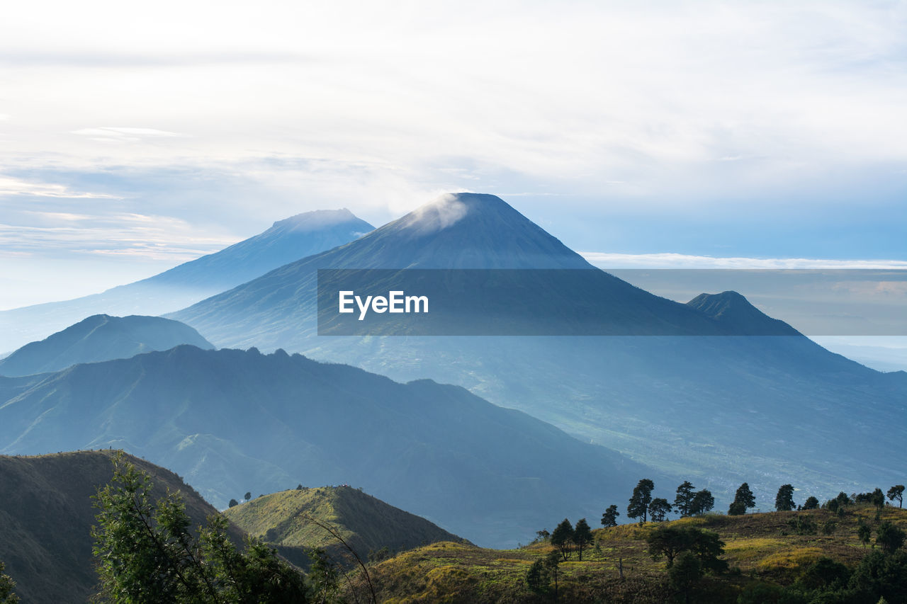 The view from the top of mount prau and the activities of the climbers near the camping tent