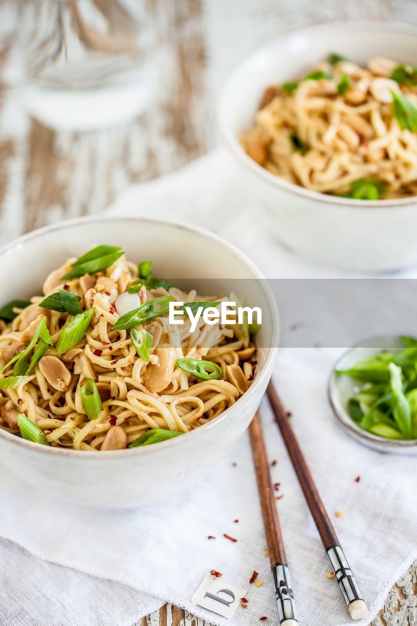 Close-up of fried noodles in bowl on table