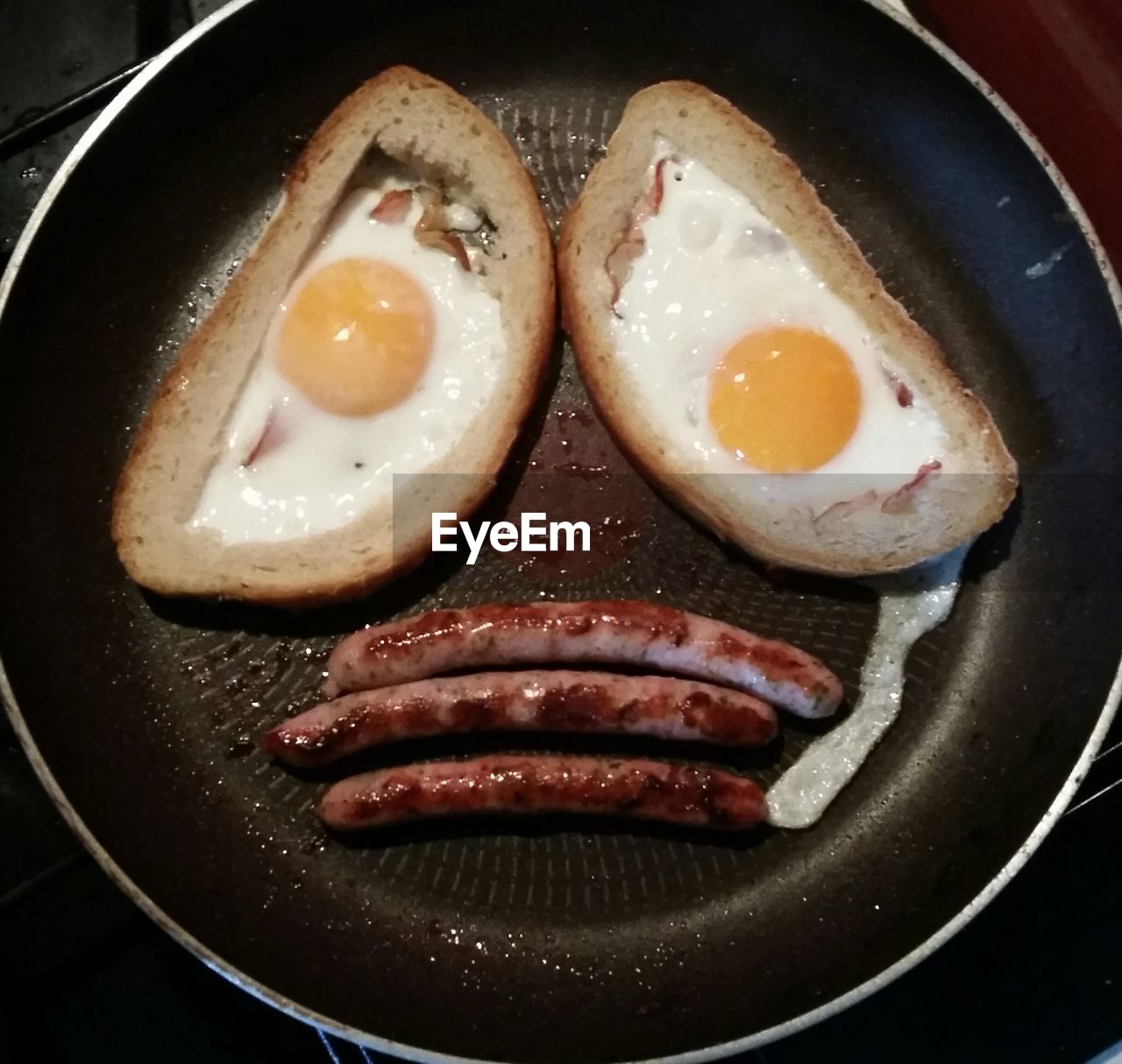 High angle view of sad face made with food in plate