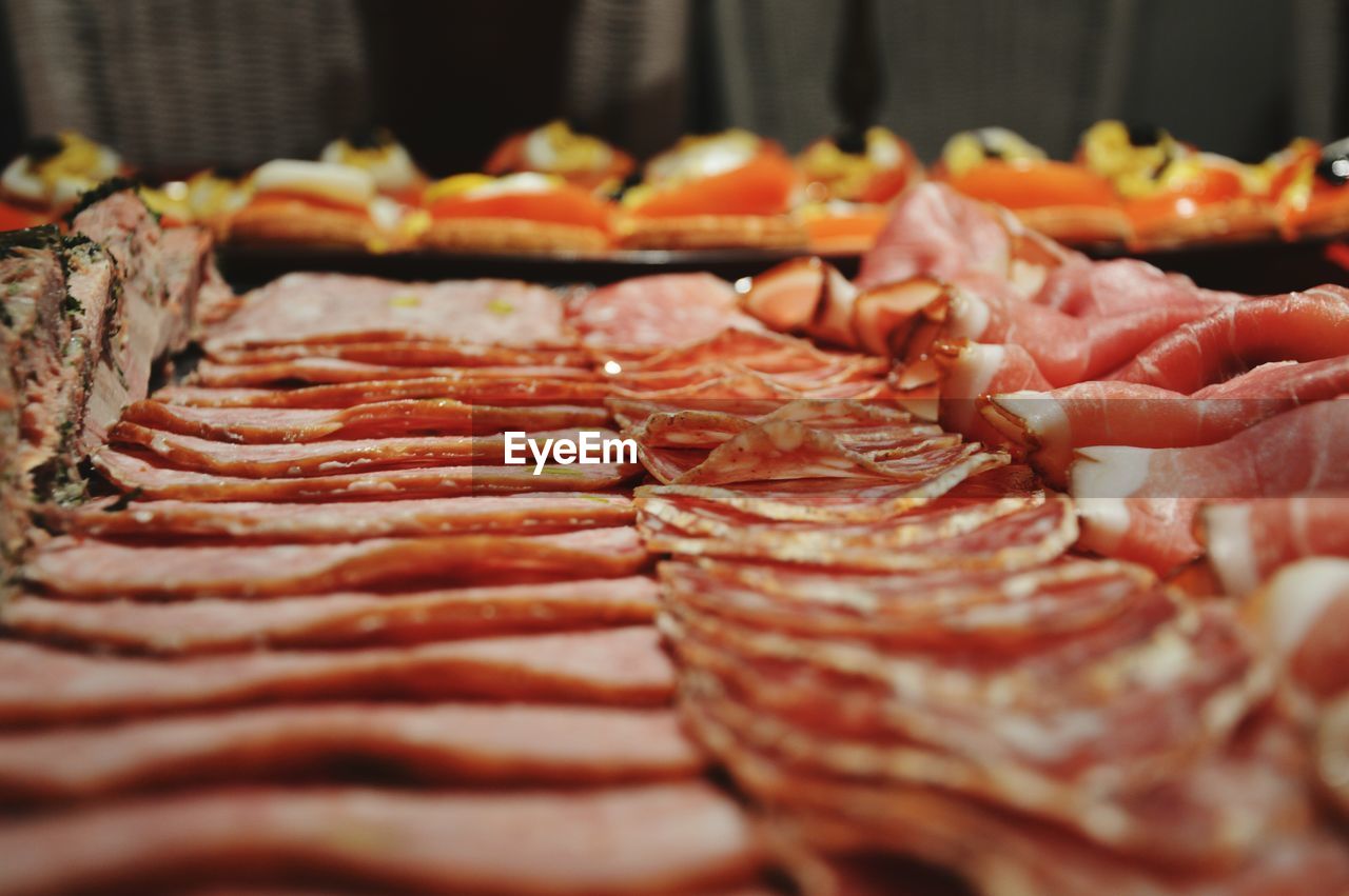 Close-up of salami arranged in charcuterie