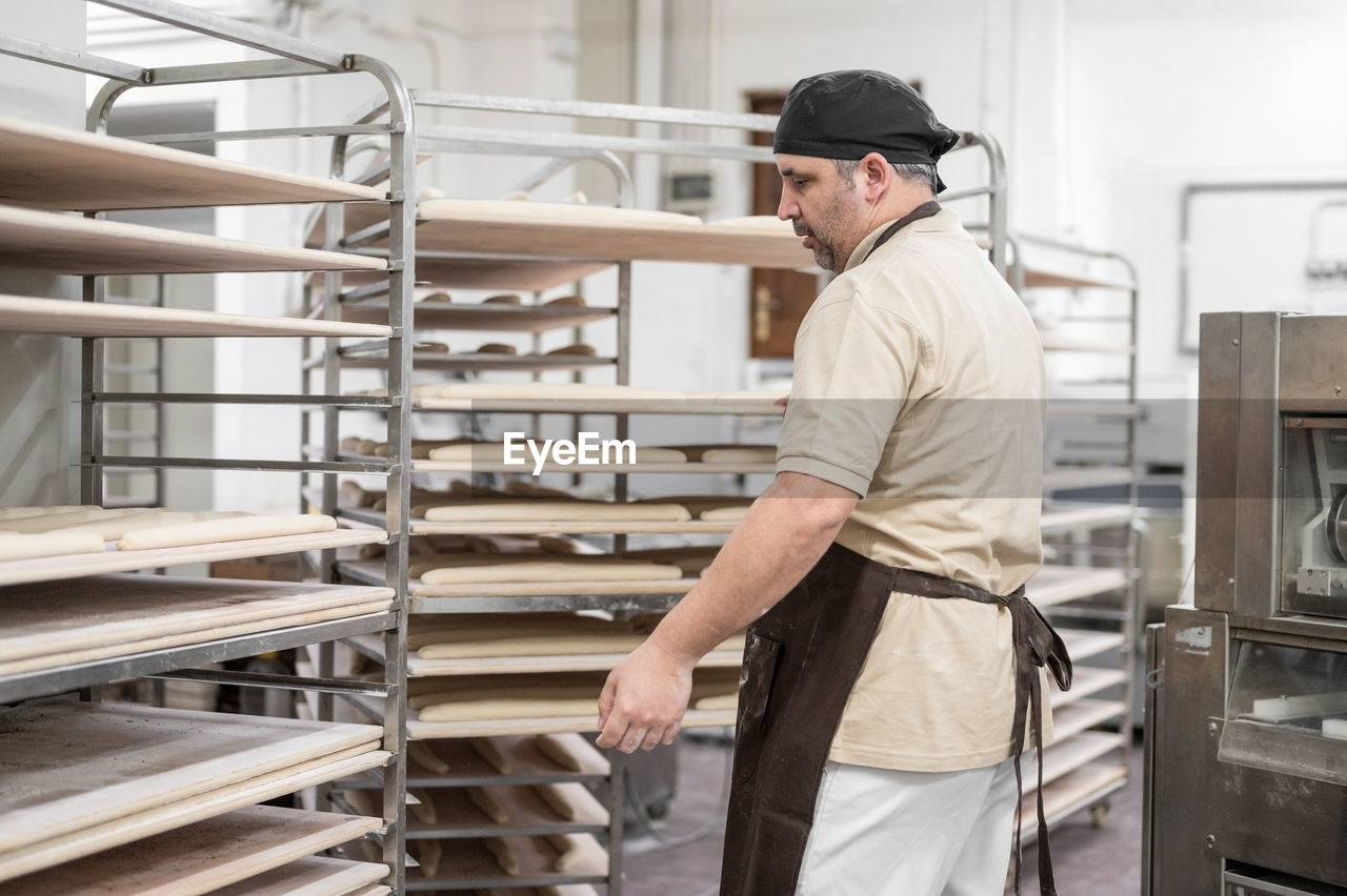 Baker preparing food at bakery