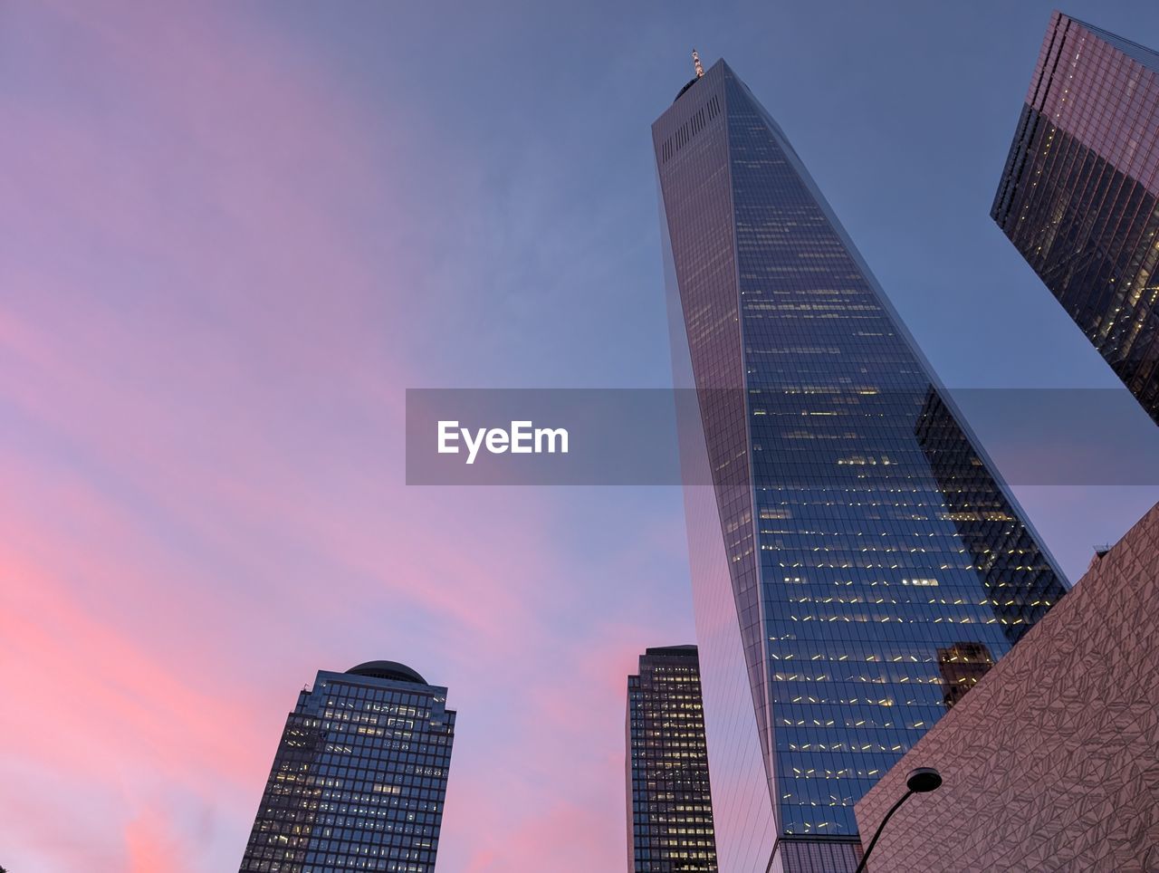 architecture, city, built structure, building exterior, office building exterior, skyscraper, building, sky, landscape, skyline, urban skyline, metropolitan area, office, sunset, business, nature, cityscape, downtown district, urban area, residential district, travel destinations, downtown, tower block, landmark, city life, no people, cloud, metropolis, business finance and industry, low angle view, tower, finance, travel, outdoors, dusk, evening, blue, finance and economy, horizon, illuminated