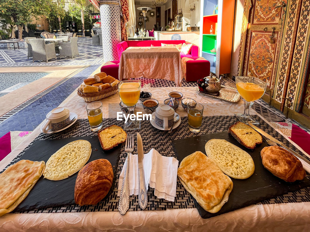 food and drink, food, table, bread, meal, freshness, no people, baked, healthy eating, snack, seat, fast food, brunch, drink, business, wellbeing, day, breakfast, chair, french food, architecture, bakery, furniture, plate, outdoors, restaurant