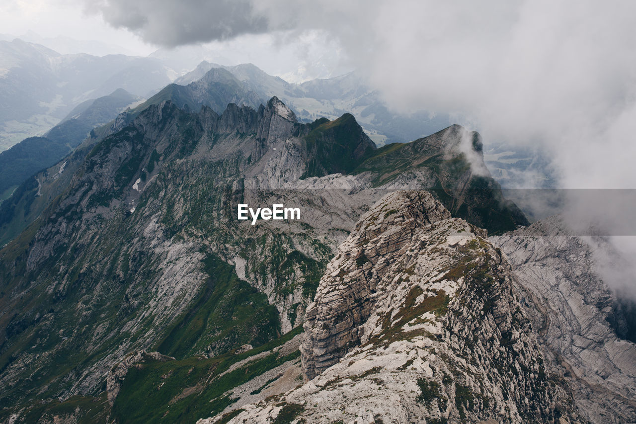 Panoramic view of rocky mountains against sky