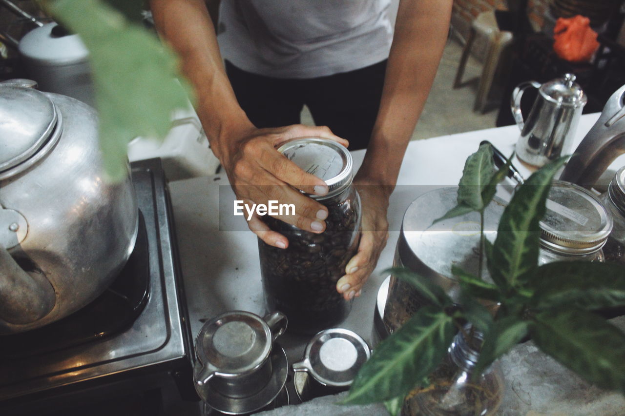 High angle view of man preparing food